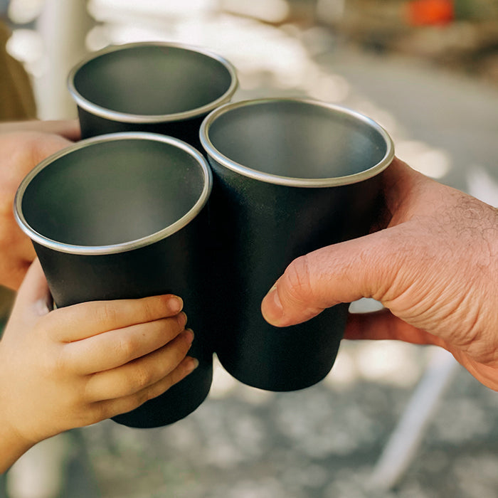 16oz-pint-cup-e1 16ounce_steel_pint_cup_black_4pack_lifestyle_94c6fc4c-80d1-4474-acfc-5e0874356ee4.jpg