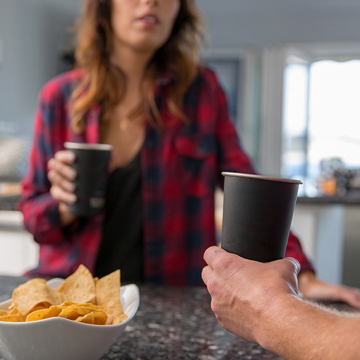 16oz-pint-cup-e1 16ounce_steel_pint_cup_black_party_lifestyle_e7c4b89f-bee2-44df-bb63-bc286febb421.jpg