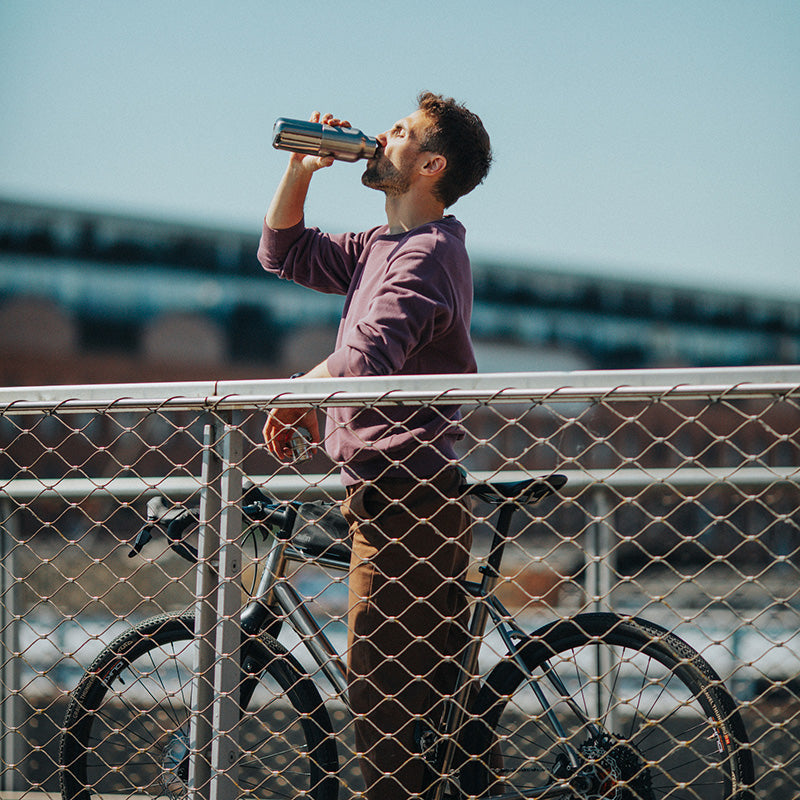 12oz-rise-reflect-with-bamboo-cap-m2 16oz_rise_reflect_man_bike_square.jpg