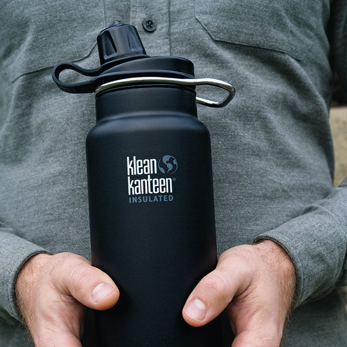 tkwide-chug-cap-q1 K32TKWSSL-SB-Craddled-Bottle_closeup_lifestyle.jpg