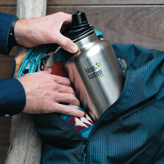 tkwide-chug-cap-q1 K64TKWSSL-BS-Chug-Cap-Out-of-Duffle_lifestyle.jpg